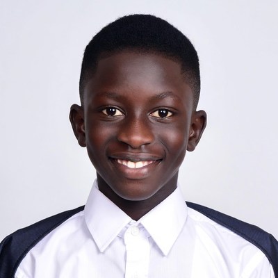 Smiling African boy in school uniform