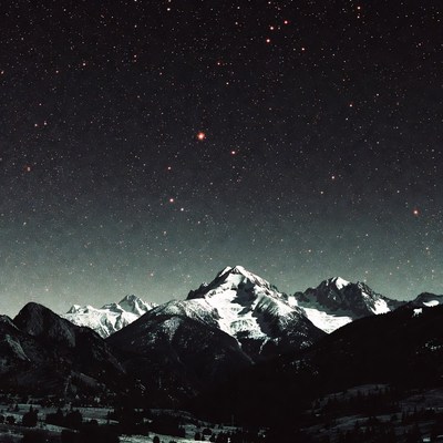 Snowy Mountains Under Starry Night Sky
