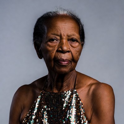 Elderly African-American woman in sequin dress