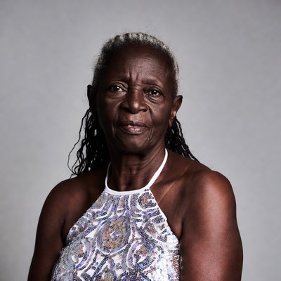 Elderly African woman in beaded dress