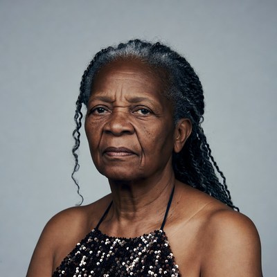 Elderly African-American woman in sequin dress