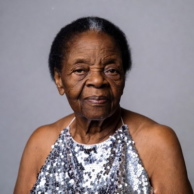 Elderly African-American woman in sequin dress