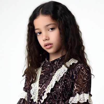 Young girl in lace dress portrait