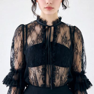 Asian woman in black lace blouse