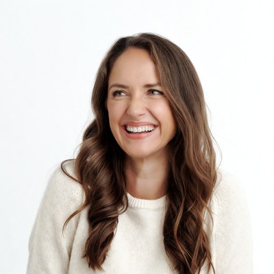 Smiling woman with long brown hair