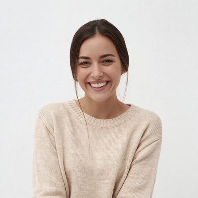 Smiling woman in beige sweater