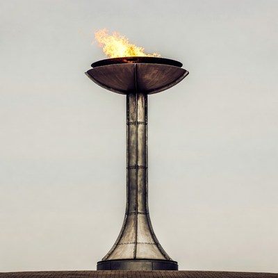 Flaming Olympic Torch on Pedestal