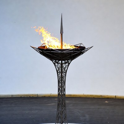 Burning Olympic Torch on Tower