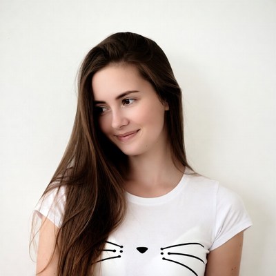 Woman in cat face t-shirt smiling