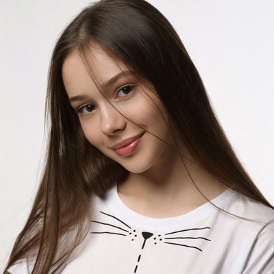 Girl smiling in cat face t-shirt