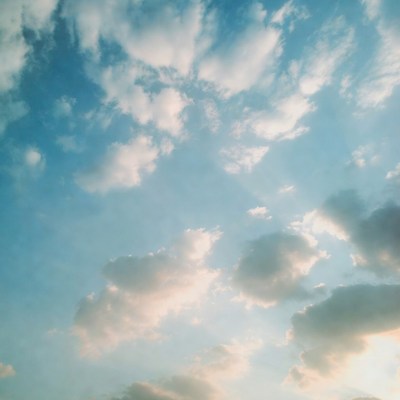 Fluffy Clouds in Blue Sky