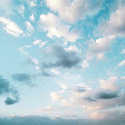 Fluffy Clouds in Blue Sky