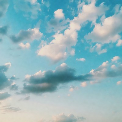 Fluffy Clouds in Blue Sky