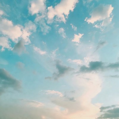 Fluffy Clouds in Blue Sky