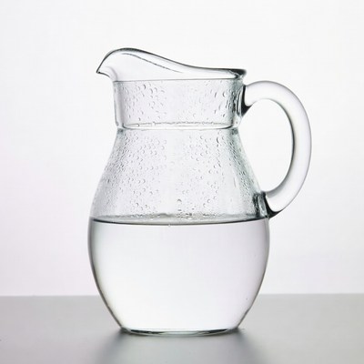 Glass water pitcher with droplets