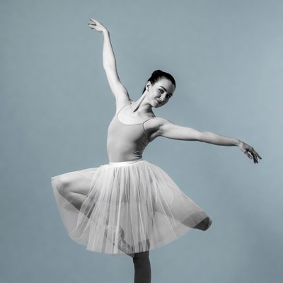 Ballerina in tutu performing pose
