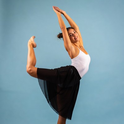 Woman performing ballet dancer pose