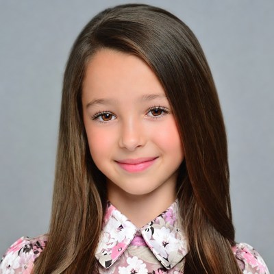 Smiling girl with long brown hair