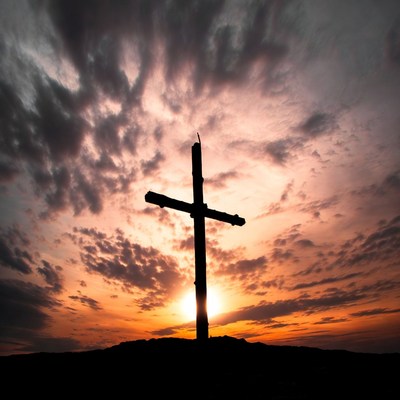 Silhouette Cross at Sunset