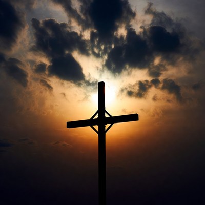 Cross Silhouette Against Sunset Clouds