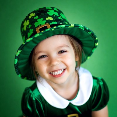 Girl wearing shamrock leprechaun hat