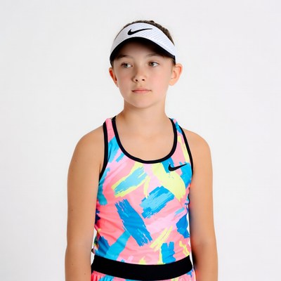 Girl in Nike tennis outfit