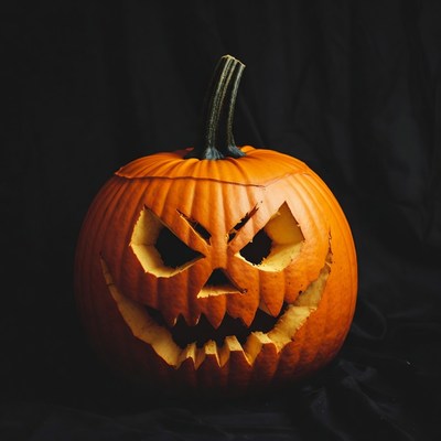 Carved Jack-o'-lantern on black background