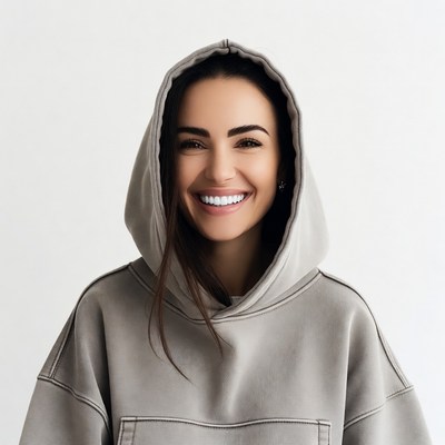 Smiling woman in gray hoodie
