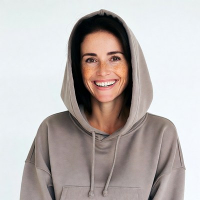 Smiling woman in gray hoodie