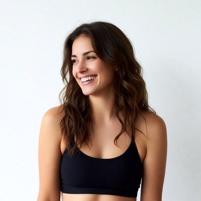 Smiling woman in black sports bra