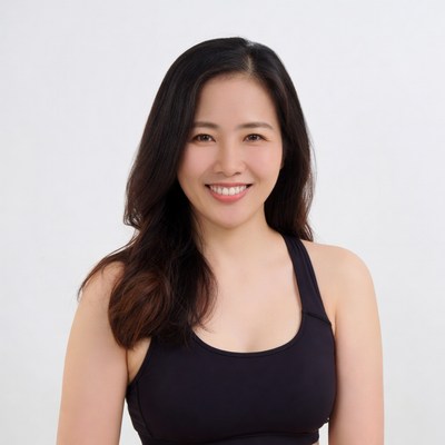 Asian woman in black sports bra