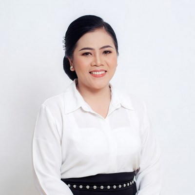 Asian woman in white blouse smiling