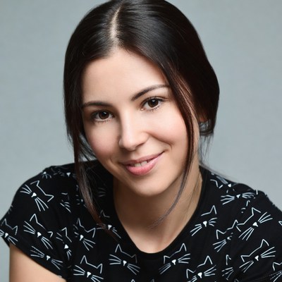 Smiling woman in black cat shirt