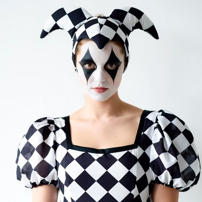 Woman in black and white jester costume