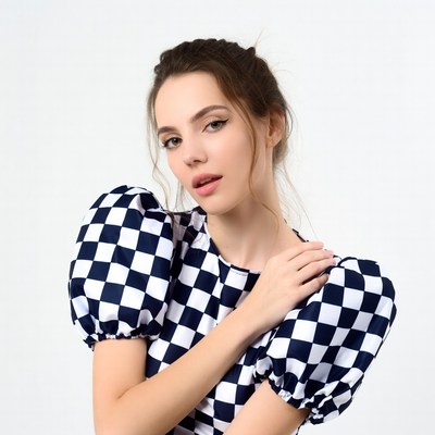 Woman in checkered puff sleeve dress