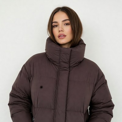 Woman in brown puffer jacket