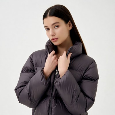 Woman in gray puffer jacket