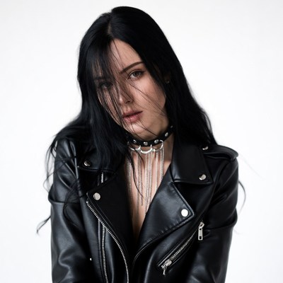 Woman in black leather jacket