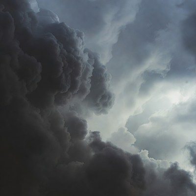 Dark Storm Clouds with Sunlight