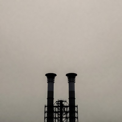 Two Industrial Chimneys Silhouette