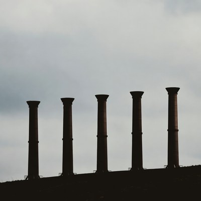 Five Industrial Chimneys Silhouette