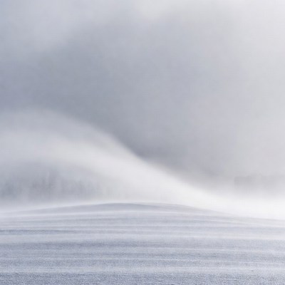 Snowy Landscape with Swirling Snow
