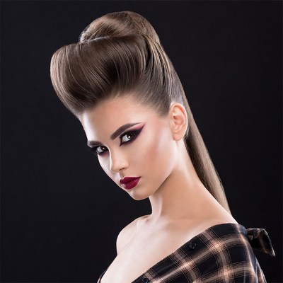 Woman with retro beehive hairstyle