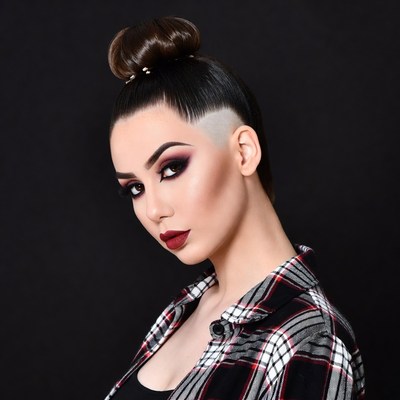 Woman with undercut hairstyle and bun