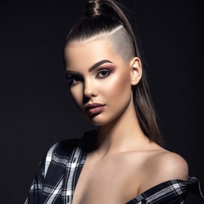 Woman with undercut ponytail hairstyle