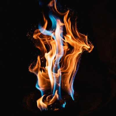 Blue and orange flames on black background
