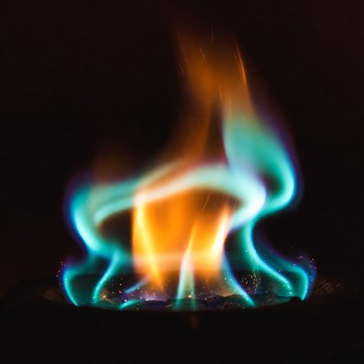 Blue and orange flames on black background