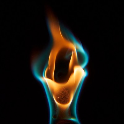 Vibrant blue orange flames on black