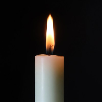 White Candle Burning Flame