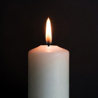 White Candle Burning Flame